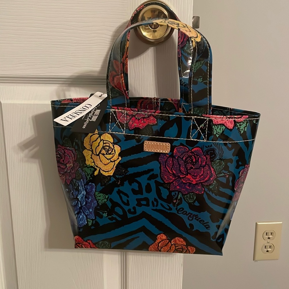 NWT Consuela Bag with Flowers on outside and  inside bottom piece to hold shape!